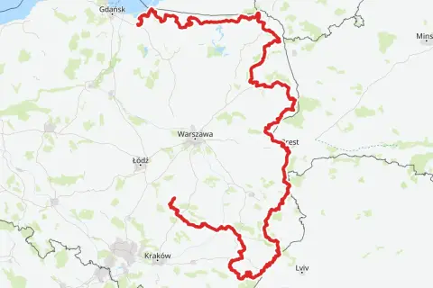 Mapa Polski z zaznaczoną na czerwono najdłuższą ścieżką rowerową w Polsce, biegnącą od wybrzeża Bałtyku przez Warszawę aż po okolice Krakowa.