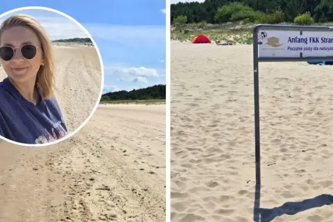 Kobieta na plaży w Niemczech, obok znak "Anfang FKK Strand", czyli początek plaży dla naturystów.